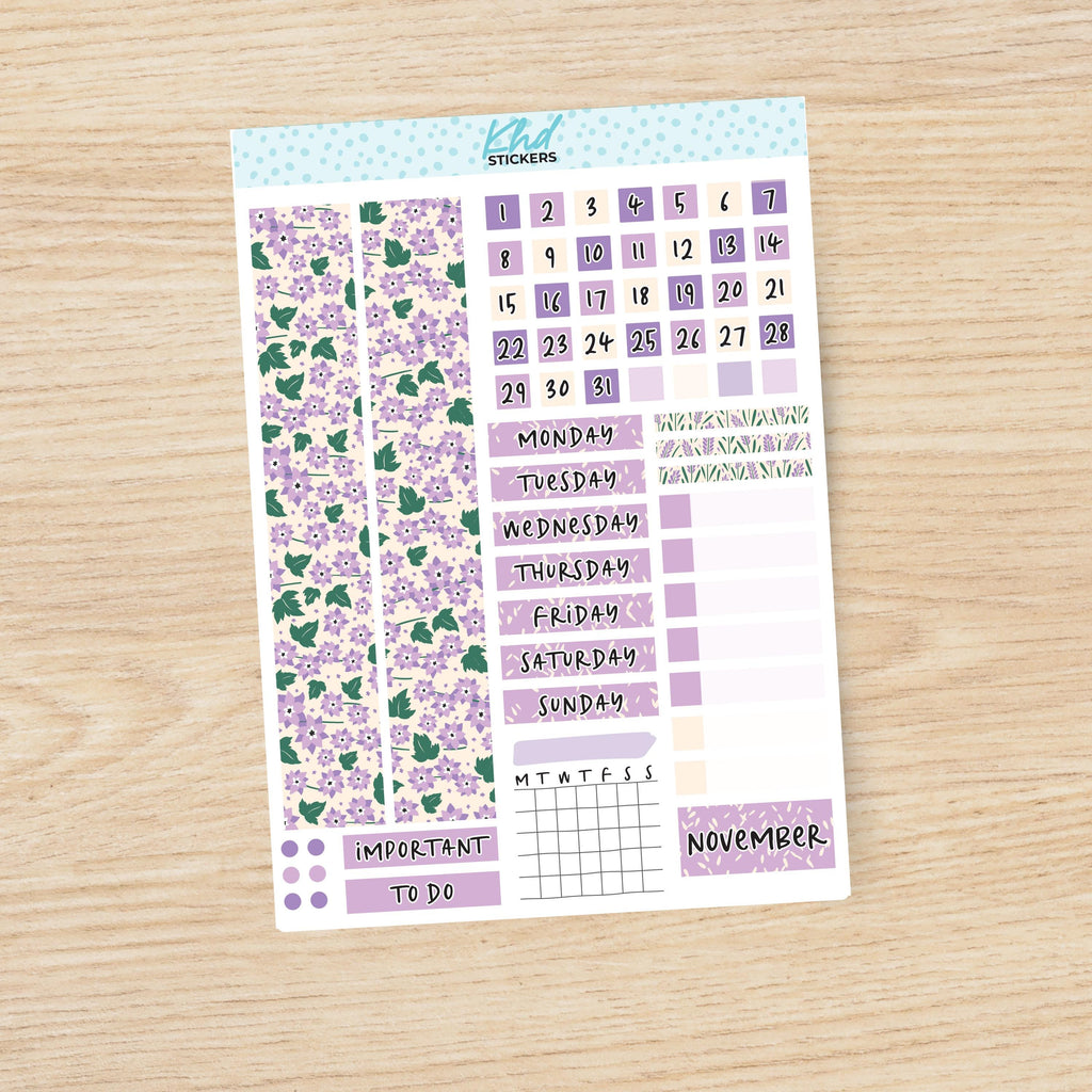 a calendar sticker with flowers on it